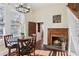 Cozy breakfast nook with table, fireplace, light and staircase at 1325 Whitlock Sw Ave, Marietta, GA 30064