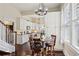 Bright breakfast nook with natural light, table, and connection to the modern kitchen at 1325 Whitlock Sw Ave, Marietta, GA 30064