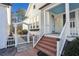 Exterior view of a front porch with a white picket fence and stone walkway at 1325 Whitlock Sw Ave, Marietta, GA 30064