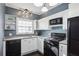 Well-lit kitchen with modern appliances, ample counter space, and a functional layout at 1325 Whitlock Sw Ave, Marietta, GA 30064