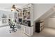 Home office with custom built-in shelving, desk space, and natural light at 1325 Whitlock Sw Ave, Marietta, GA 30064