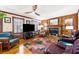 Elegant living room boasting hardwood floors, a cozy fireplace, and comfortable seating, perfect for relaxation at 1532 Boxwood Nw Trce, Acworth, GA 30102