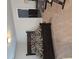 This cozy bedroom features a large black patterned bed, a workspace, and a large closet in view at 3671 Casual Ridge Way, Loganville, GA 30052