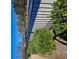 Community tennis courts featuring a blue playing surface with black fencing at 3671 Casual Ridge Way, Loganville, GA 30052