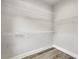 A walk-in closet complete with white wire shelving at 7608 Parkland Bnd, Fairburn, GA 30213