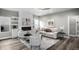 Inviting living room showcasing a fireplace, tasteful decor, and comfortable seating at 7608 Parkland Bnd, Fairburn, GA 30213