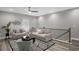 Cozy loft area with comfortable seating, stylish decor, and natural light at 7608 Parkland Bnd, Fairburn, GA 30213