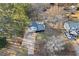 Aerial view of home with a pool and detached garage at 916 Marshall Fuller Rd, Dallas, GA 30157
