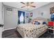 Bedroom decorated with toys, pictures and neutral paint at 916 Marshall Fuller Rd, Dallas, GA 30157