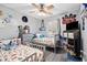 bedroom with two twin beds, ceiling fan and grey walls at 916 Marshall Fuller Rd, Dallas, GA 30157