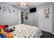 Comfortable bedroom with plush pillows, ceiling fan, and closet at 916 Marshall Fuller Rd, Dallas, GA 30157