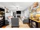Bright and airy living room with hardwood flooring and a decorative fireplace at 916 Marshall Fuller Rd, Dallas, GA 30157