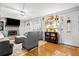 Comfortable living room featuring a stone fireplace and neutral decor at 916 Marshall Fuller Rd, Dallas, GA 30157