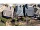 Aerial view of the roof and backyard featuring neighboring houses and mature trees at 1837 Haven Park Se Cir, Smyrna, GA 30080