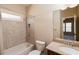 Well-lit bathroom featuring a shower/tub combination and a vanity with granite countertops at 1837 Haven Park Se Cir, Smyrna, GA 30080