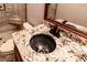 Chic bathroom boasts granite countertops and a vessel sink with a decorative faucet at 1837 Haven Park Se Cir, Smyrna, GA 30080