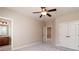 Spacious bedroom with a ceiling fan and access to the bathroom at 1837 Haven Park Se Cir, Smyrna, GA 30080