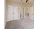 Bright bedroom featuring neutral carpeting, ceiling fan and a closet for ample storage at 1837 Haven Park Se Cir, Smyrna, GA 30080