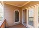 A private outdoor deck with wooden flooring and railings, offering a tranquil view with a sliding glass door access at 1837 Haven Park Se Cir, Smyrna, GA 30080