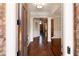 Elegant entryway featuring hardwood floors, decorative columns, and detailed trim work at 1837 Haven Park Se Cir, Smyrna, GA 30080