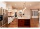 Spacious kitchen with stainless steel appliances, central island, and hardwood floors at 1837 Haven Park Se Cir, Smyrna, GA 30080