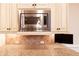 Close-up of microwave and granite countertops at 1837 Haven Park Se Cir, Smyrna, GA 30080