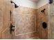 A beautifully tiled walk-in shower features dual shower heads and recessed shelving at 1837 Haven Park Se Cir, Smyrna, GA 30080