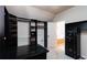 This walk-in closet features custom shelving, a safe, and access to the bathroom at 1837 Haven Park Se Cir, Smyrna, GA 30080