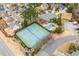 Aerial view of tennis courts and community pool nestled in a residential neighborhood at 2038 Drogheda Ln, Marietta, GA 30066