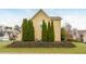 Backyard view showcasing the well-maintained lawn, mature trees, and peaceful setting at 2038 Drogheda Ln, Marietta, GA 30066