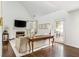 Inviting living room featuring a fireplace and access to the patio at 2038 Drogheda Ln, Marietta, GA 30066