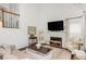 Bright living room with a fireplace and neutral decor at 2038 Drogheda Ln, Marietta, GA 30066