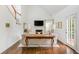 Spacious living room featuring hardwood floors and access to the patio at 2038 Drogheda Ln, Marietta, GA 30066