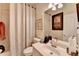 Standard bathroom with vanity and shower featuring decorative shower curtain at 2730 Henderson Chase Ct, Tucker, GA 30084