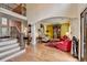 Spacious foyer with hardwood floors, staircase, and entry to a well-appointed living area at 2730 Henderson Chase Ct, Tucker, GA 30084