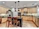 Kitchen featuring stainless steel appliances and a center island with breakfast bar at 2730 Henderson Chase Ct, Tucker, GA 30084