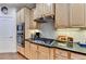 Bright kitchen featuring stainless steel appliances and a gas cooktop at 2730 Henderson Chase Ct, Tucker, GA 30084