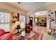 Inviting living room providing an open view to the dining area, hardwood floors, and natural light at 2730 Henderson Chase Ct, Tucker, GA 30084