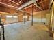 Spacious garage featuring multiple doors and ample room for parking and storage solutions at 610 Coolsprings Ln, Woodstock, GA 30188