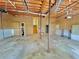 Well-lit garage with added storage and shelving, plus easy interior access to upper level at 610 Coolsprings Ln, Woodstock, GA 30188