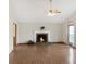 Living room features fireplace and hardwood floors at 610 Coolsprings Ln, Woodstock, GA 30188