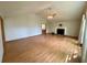 Spacious living room with a fireplace and hardwood floors at 610 Coolsprings Ln, Woodstock, GA 30188