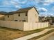 View of the backyard and fence surrounding the back of the home at 11978 Quail Rd, Hampton, GA 30228