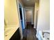 Bathroom with vinyl floors, tub, shower, closet and toilet room at 11978 Quail Rd, Hampton, GA 30228
