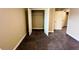 Bedroom with a closet and doorway to the hallway at 11978 Quail Rd, Hampton, GA 30228