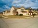 Street view of home showcasing the well-manicured lawn and attached two-car garage at 11978 Quail Rd, Hampton, GA 30228