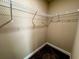 Walk-in closet with wire shelving and carpet at 11978 Quail Rd, Hampton, GA 30228