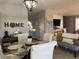 Inviting dining area featuring decor, coffee bar, natural light and a modern chandelier at 3302 Willow Meadow Ln, Douglasville, GA 30135