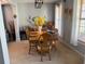 Inviting dining room with a wooden table, seating for six, and a view of the window at 3302 Willow Meadow Ln, Douglasville, GA 30135