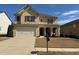 Charming two-story home with a well-manicured lawn and attached two-car garage at 3302 Willow Meadow Ln, Douglasville, GA 30135